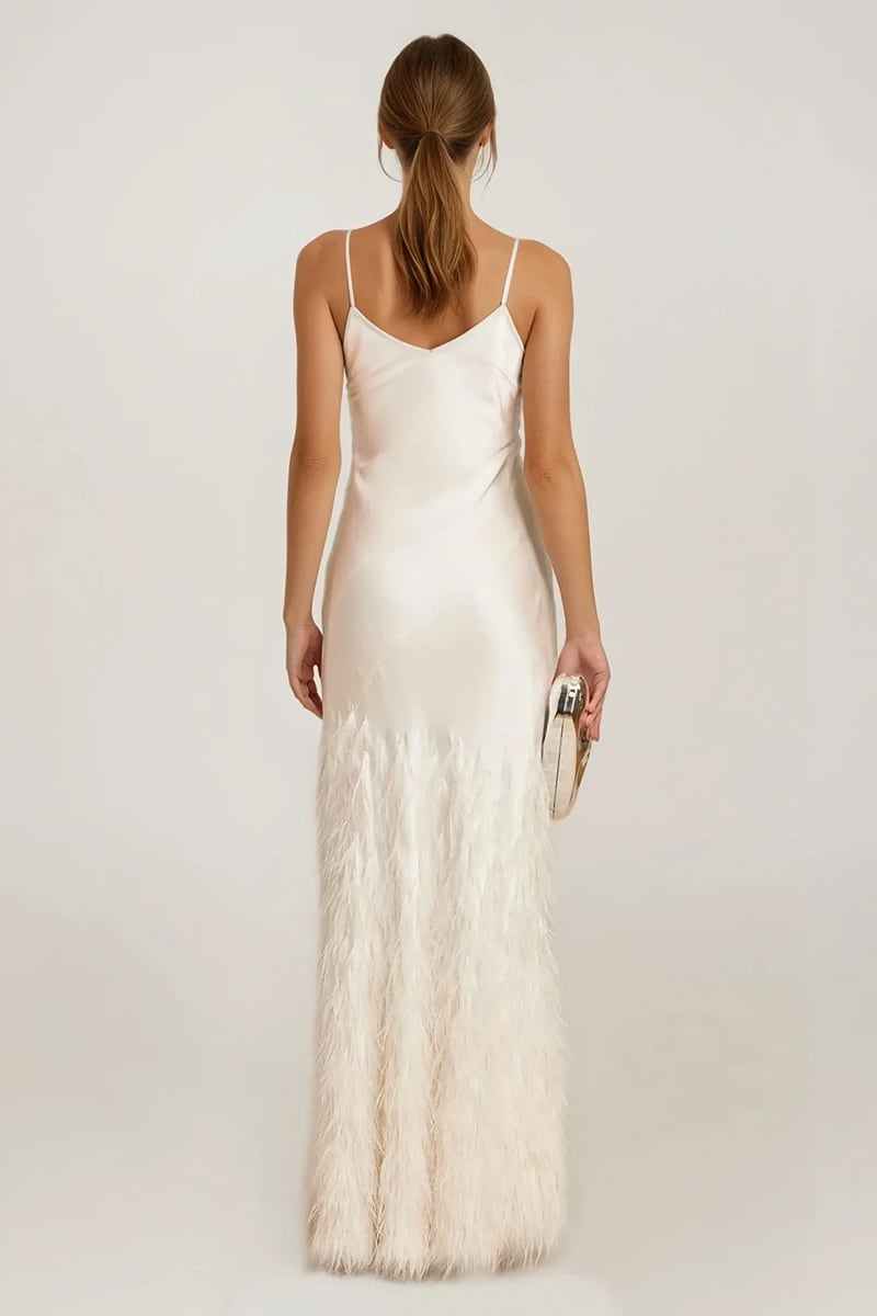 Handmade ivory satin gown with cascading ostrich feather train