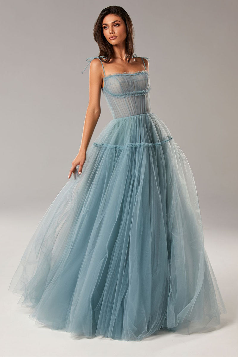 http://www.jewelclues.com/cdn/shop/products/alluring-beauty-tie-strap-tulle-maxi-dress_0009_dusty-blue-1.jpg?v=1646784579&width=2048